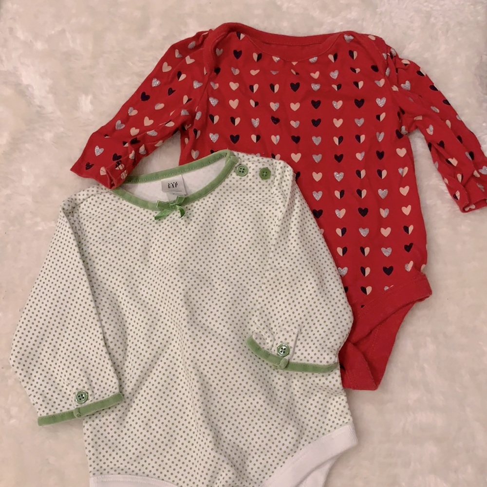 Two Baby Gap long sleeve bodysuits